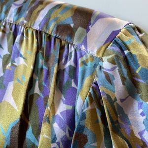 Designer silk blouse. Olive, purple/lavender, light teal design. New w/ buttons.